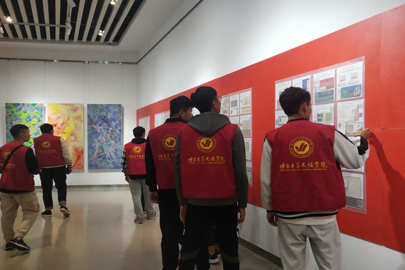 机电学子走进莱山图书馆开展志愿服务活动.jpg 机电学子走进莱山图书馆开展志愿服务活动.jpg